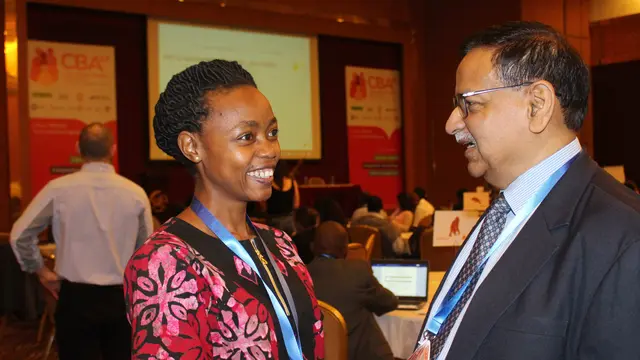 CBA13 networking: IIED senior fellow and director of the International Centre for Climate Change and Development (ICCCAD) Saleemul Huq in conversation with Susan Nanduddu, director of the Uganda-based African Centre for Trade and Development
