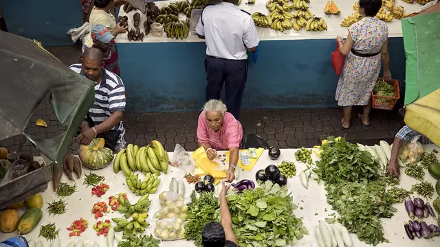 Street vendor selling vegetables