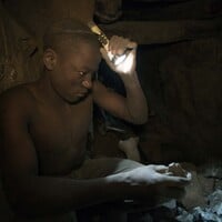 A man holding a flashlight.