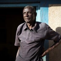 Man standing in front of a wall.