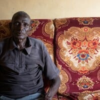 Man sitting on a couch.