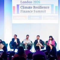 This photo shows the panel of a parallel session, including: Holly Turner (head of sustainable investment, Schroders Capital), Marco Serena (chief sustainable impact officer, Private Infrastructure Development Group), Thomas Van Rompaey( global responsible investment manager – real estate equity and debt, BNP Paribas AM), Paul Munday (director, climate adaptation and resilience specialist, S&P Global Ratings) and Trisha Taneja (director of investor strategies programme, Institutional Investors Group on Clim