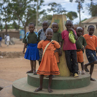 17. Children gather in Mawemeru village, where gold mining is the main livelihood and helps to provide education for some
