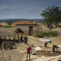 9. Workers sift through rocks containing gold at Nsangano Gold Mine