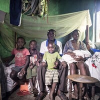 Chris Byamukama, 27, is a food vendor. Chris and his wife Rose Biira, 24, have four children. Chris is the chairman of the Fort Portal Food Vendors Association (Photo: Sven Torfinn/Panos Pictures)