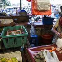 Ato, 51, is a street food vendor. He shops for raw materials at a traditional market in Bandung (Photo: Kemal Jufri/Panos Pictures)