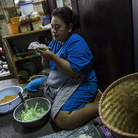 Preparing traditional West Javanese snacks to sell at the Tegalega market in Bandung is a shared burden for Ato and his wife Wanti, 40. Local legislation means this couple can only sell their products from 5am to 11am (Photo: Kemal Jufri/Panos Pictures)