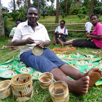 A group of women making baskets