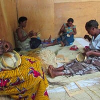 Women weaving baskets